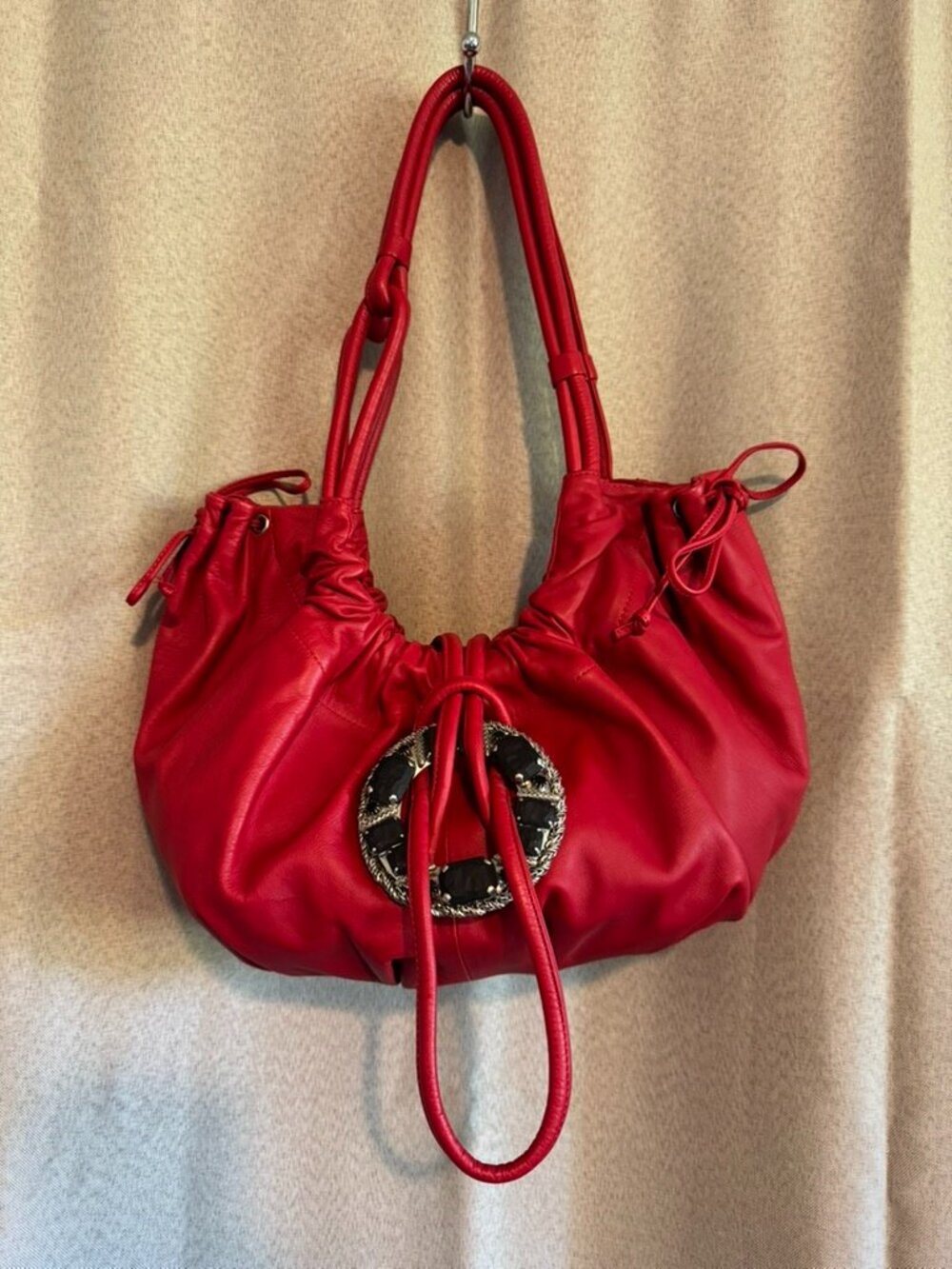 Renato Angi red leather purse with medalion